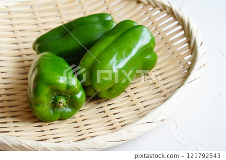 Fresh bell peppers on a colander 121792543