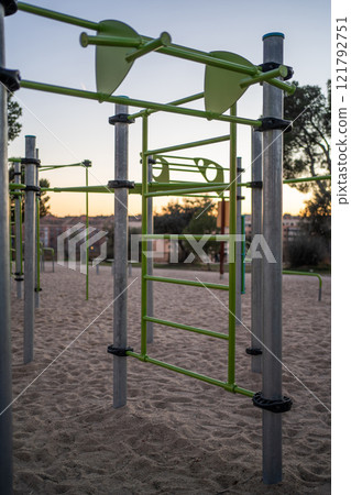 street fitness park for workout and calisthenics area, sport equipment with bars for push and pull ups, healthy lifestyle concept street fitness park for workout and calisthenics area, sport equipment with bars for push and pull ups, healthy lifestyle concept 121792751