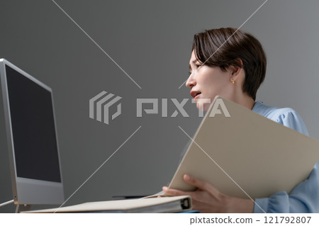 Woman overtime Woman overtime 121792807