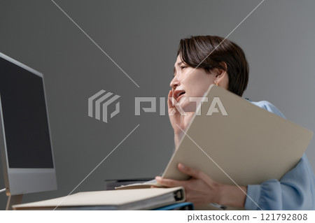 Woman overtime Woman overtime 121792808