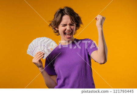 Amazed Woman With Money Cash. Happy Lady Got Usd Dollars Banknotes On Yellow Amazed Woman With Money Cash. Happy Lady Got Usd Dollars Banknotes On Yellow 121793445