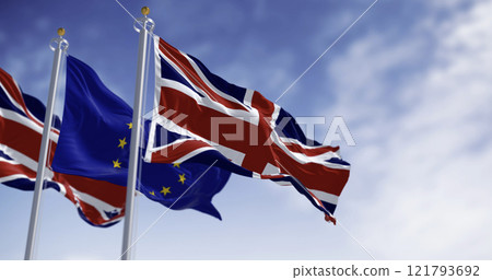 Flags of United Kingdom and the European Union waving in the wind Flags of United Kingdom and the European Union waving in the wind 121793692
