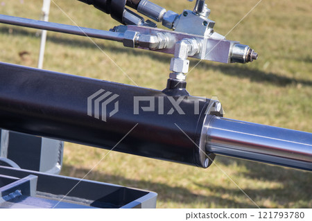 Black pistons or actuators as part of pneumatic or hydraulic machine. Technology 121793780