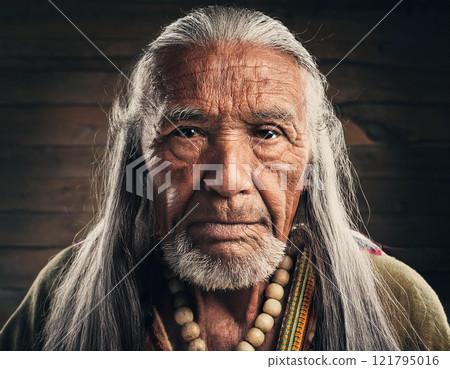 Old grumpy wrinkled man looking at camera Old grumpy wrinkled man looking at camera 121795016