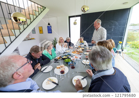 Gathering Together Around the Table for a Satisfying and Delicious Meal Experience Gathering Together Around the Table for a Satisfying and Delicious Meal Experience 121795680