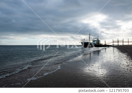 Eierland, De Cocksdorp, Texel, The Netherlands, Oktober 28th, 2024, A Stormy Seascape with a Fishing Eierland, De Cocksdorp, Texel, The Netherlands, Oktober 28th, 2024, A Stormy Seascape with a Fishing 121795703