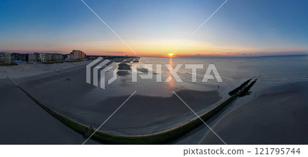 Witnessing a Stunning Sunset Over a Serene Beach Landscape that Captivates the Heart and Soul Witnessing a Stunning Sunset Over a Serene Beach Landscape that Captivates the Heart and Soul 121795744