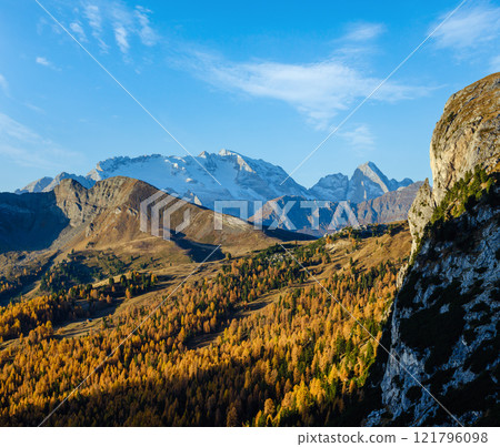Autumn alpine Dolomites mountain view from Falzarego Pass to Marmolada massif and Glacier. 121796098