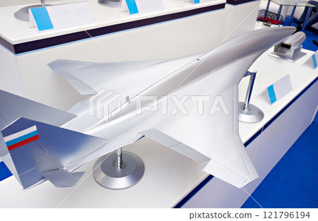 Model of military fighter plane at exhibition 121796194