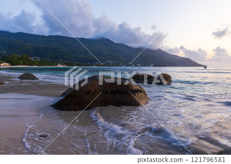 Beau Vallon Beach, Seychelles. Landscape with wet sand and rocks 121796581