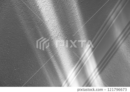 Abstract minimal white interior fragment with pattern of bright light 121796673