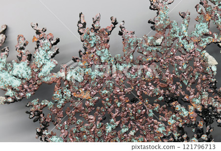 Native copper, macro photo of natural crystal over gray wall 121796713