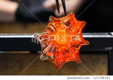 Works at glass blowing workshop 121796741