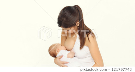 Happy mother breastfeeding her baby on white background 121797743