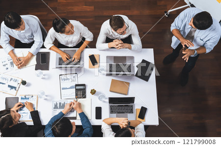 Analyst team utilizing BI Fintech to analyze financial data at table. Prudent Analyst team utilizing BI Fintech to analyze financial data at table. Prudent 121799008