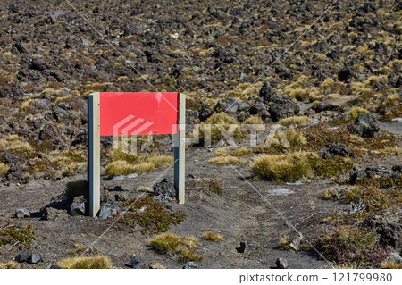 Sign board on mountain trail 121799980