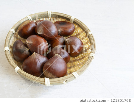 Chestnuts in a basket 121801768