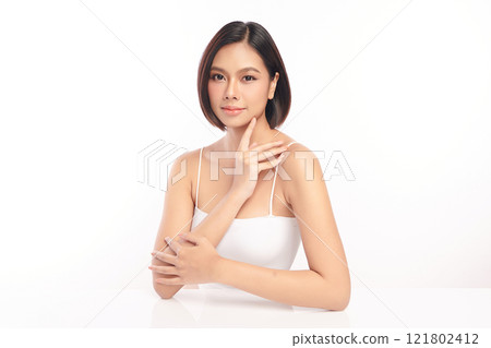 Beautiful young asian woman with clean fresh skin on white background, Face care, Facial treatment, Cosmetology, beauty and spa, Asian women portrait. Beautiful young asian woman with clean fresh skin on white background, Face care, Facial treatment, Cosmetology, beauty and spa, Asian women portrait. 121802412
