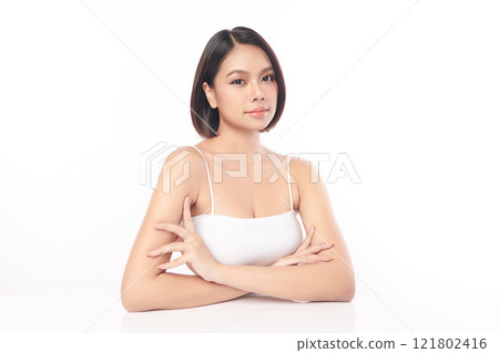 Beautiful young asian woman with clean fresh skin on white background, Face care, Facial treatment, Cosmetology, beauty and spa, Asian women portrait. Beautiful young asian woman with clean fresh skin on white background, Face care, Facial treatment, Cosmetology, beauty and spa, Asian women portrait. 121802416