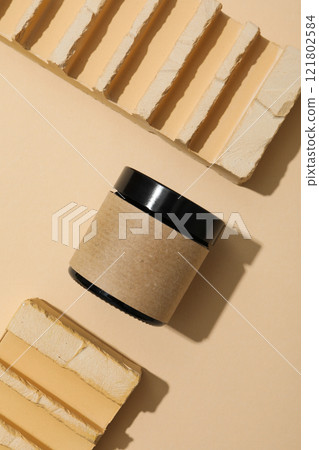 Cosmetic oil in a jar with a brick Cosmetic oil in a jar with a brick 121802584
