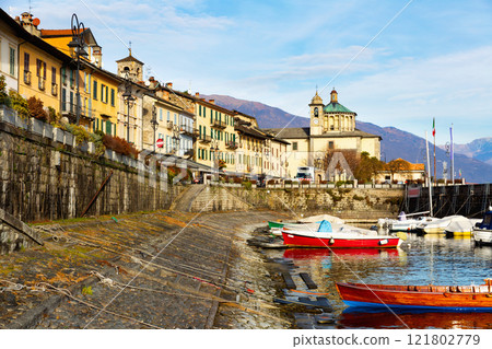 Buildings and boats along lakeshore in Cannobio, Piedmont, Italy Buildings and boats along lakeshore in Cannobio, Piedmont, Italy 121802779