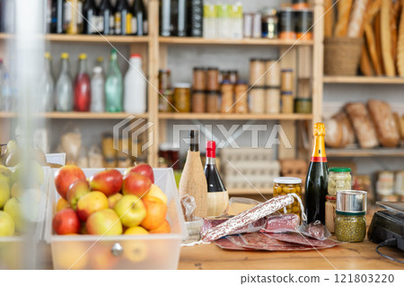 Different foods and drinks on grocery store counter Different foods and drinks on grocery store counter 121803220