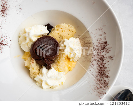 Coffee dessert tiramisu served on saucer Coffee dessert tiramisu served on saucer 121803412