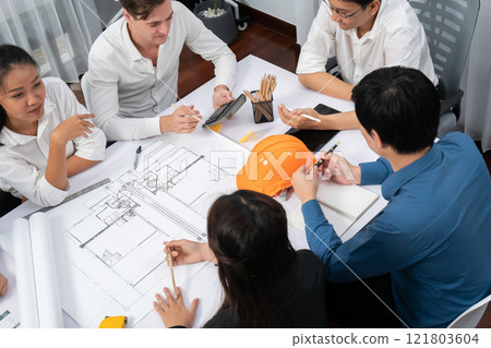 Diverse group of civil engineer and client working on architect. Prudent 121803604