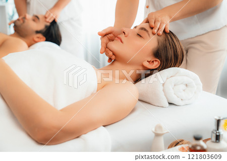 Caucasian couple enjoying relaxing anti-stress head massage. Quiescent 121803609