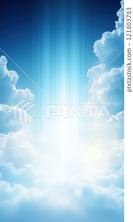 Bright blue sky with soft clouds and light rays shining down 121803783
