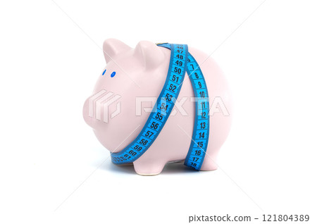 Piggy Bank With Blue Measuring Tape Symbolizing Financial Health Piggy Bank With Blue Measuring Tape Symbolizing Financial Health 121804389