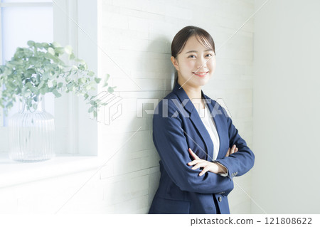 Businesswoman making arms Businesswoman making arms 121808622