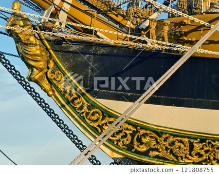 A large old ship at pier under a beautiful blue sky A large old ship at pier under a beautiful blue sky 121808755