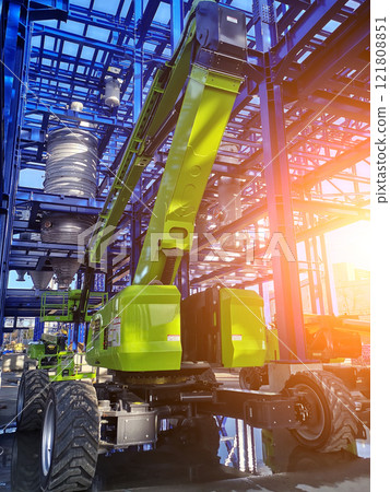 Heavy machinery involved in the process steel structure is under construction Heavy machinery involved in the process steel structure is under construction 121808851