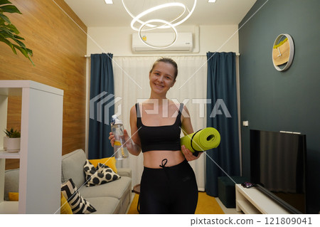 A young woman have a joyfully yoga practice A young woman have a joyfully yoga practice 121809041
