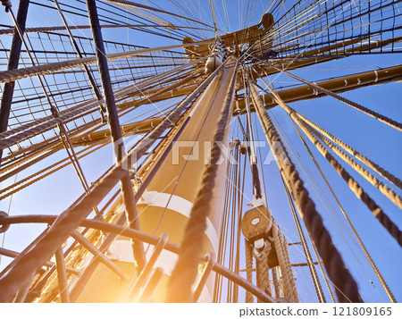 Ropes stretched across the masts of an old ship Ropes stretched across the masts of an old ship 121809165