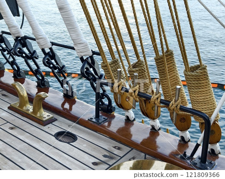 Ropes stretched across the masts of an old ship Ropes stretched across the masts of an old ship 121809366