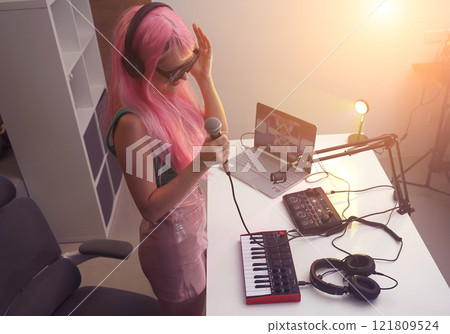 Beautiful young singer and musician broadcast from her home studio Beautiful young singer and musician broadcast from her home studio 121809524