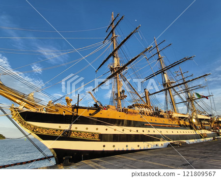 A large old ship at pier under a beautiful blue sky 121809567