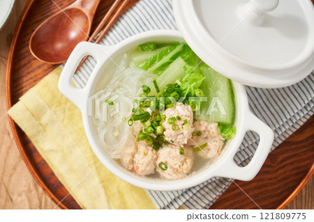 Healthy soup with chicken meatballs, Chinese cabbage and glass noodles 121809775
