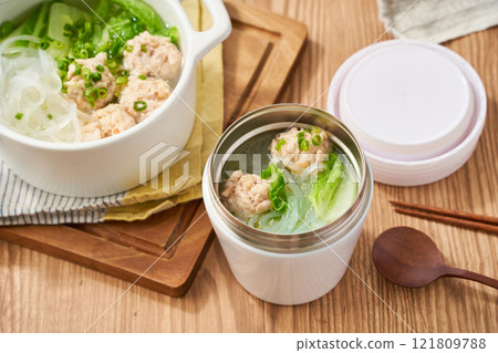 Healthy soup with chicken meatballs, Chinese cabbage and glass noodles Healthy soup with chicken meatballs, Chinese cabbage and glass noodles 121809788