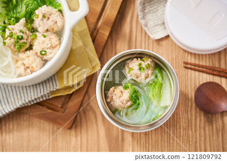 Healthy soup with chicken meatballs, Chinese cabbage and glass noodles Healthy soup with chicken meatballs, Chinese cabbage and glass noodles 121809792