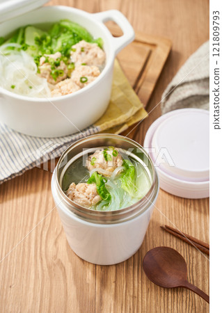 Healthy soup with chicken meatballs, Chinese cabbage and glass noodles Healthy soup with chicken meatballs, Chinese cabbage and glass noodles 121809793