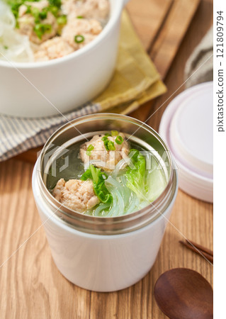 Healthy soup with chicken meatballs, Chinese cabbage and glass noodles Healthy soup with chicken meatballs, Chinese cabbage and glass noodles 121809794