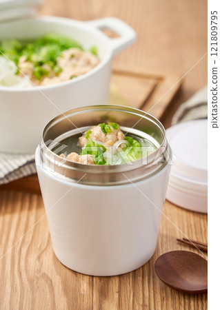 Healthy soup with chicken meatballs, Chinese cabbage and glass noodles Healthy soup with chicken meatballs, Chinese cabbage and glass noodles 121809795