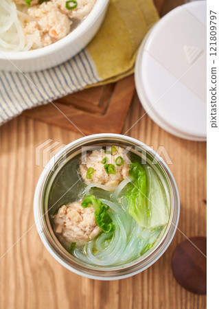 Healthy soup with chicken meatballs, Chinese cabbage and glass noodles Healthy soup with chicken meatballs, Chinese cabbage and glass noodles 121809797