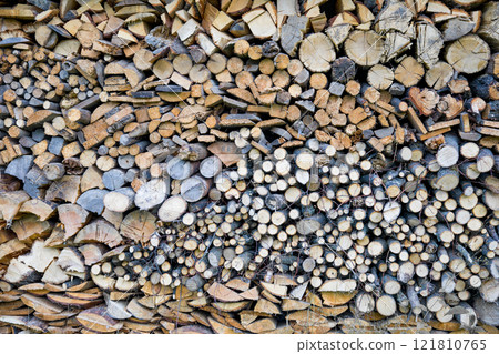 Pile of wooden logs for burning Pile of wooden logs for burning 121810765
