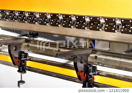 Precision metal bending equipment in a modern manufacturing facility showcases advanced technology 121811908