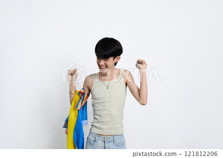 Cheerful man holding Pansexual pride flag over white background. LGBTQ pride and equality concept Cheerful man holding Pansexual pride flag over white background. LGBTQ pride and equality concept 121812206