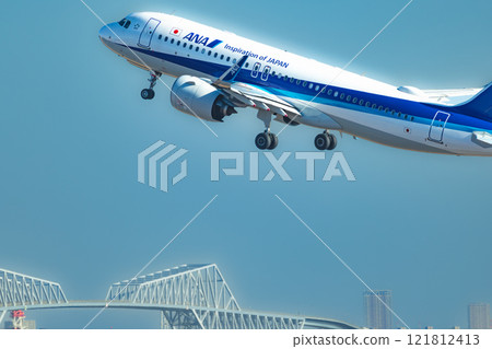 Jet passenger plane taking off from Haneda Airport Jet passenger plane taking off from Haneda Airport 121812413